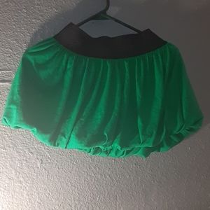 Small green skirt.